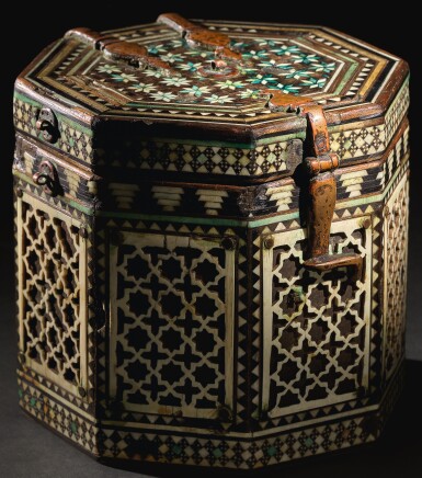 View full screen - View 1 of Lot 87. AN EXTREMELY RARE AND IMPORTANT ALMOHAD OR NASRID PYXIS, SPAIN, 12TH/13TH CENTURY.