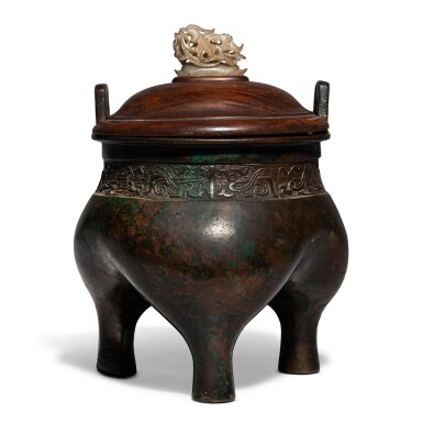 View full screen - View 1 of Lot 698. An archaistic bronze tripod censer (Ding), Qing dynasty | 清 銅冲天耳鼎式爐.
