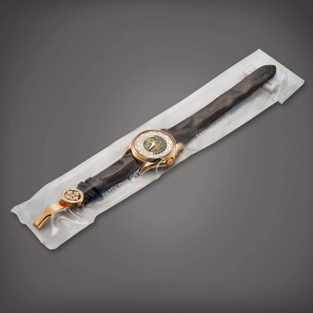 View full screen - View 1 of Lot 2303. Reference 5131 | A pink gold world time wristwatch with cloisonné enamel dial in single factory seal, Circa 2017 | 百達翡麗 | 型號5131 | 粉紅金世界時間腕錶,備掐絲琺瑯錶盤,原廠未開封,約2017年製.