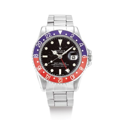 View full screen - View 1 of Lot 2091. ROLEX | GMT-MASTER "LONG E", REFERENCE 1675 A STAINLESS STEEL DUAL TIME ZONE WRISTWATCH WITH DATE AND BRACELET, CIRCA 1970" | 勞力士 | GMT-Master ""Long E"" 型號1675 精鋼兩地時間鏈帶腕錶,錶殼編號2334787,約1970年製".