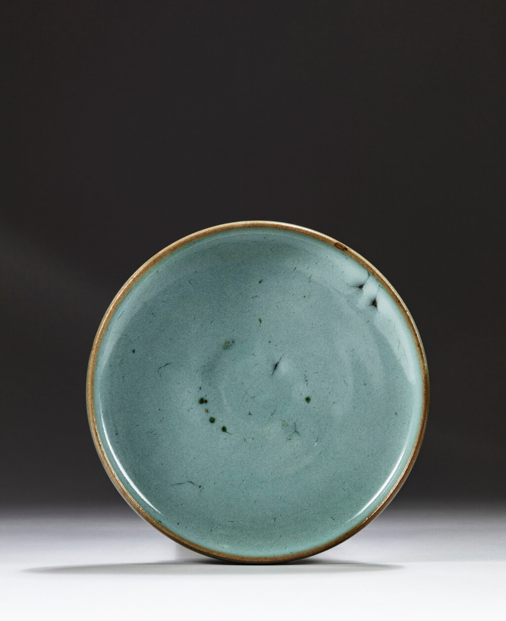 View full screen - View 1 of Lot 115. A 'Jun' blue-glazed dish, Song dynasty | 宋 鈞窰天藍釉盤.