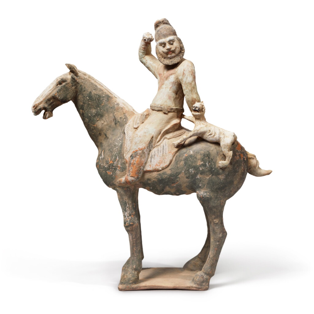View full screen - View 1 of Lot 964. A painted pottery figure of a horse and an equestrian, Tang dynasty | 唐 陶加彩騎馬俑.