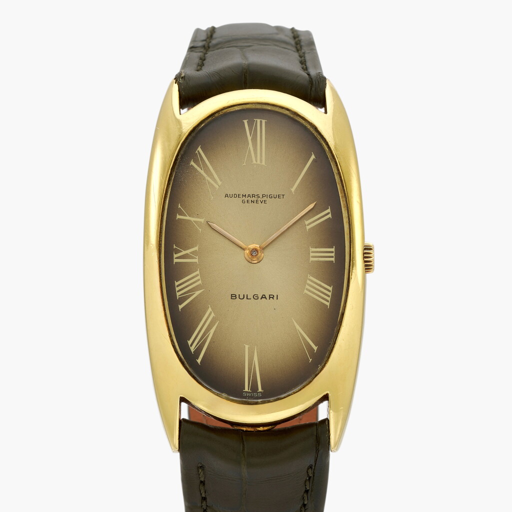 View full screen - View 1 of Lot 320. Retailed by Bulgari: A yellow gold wristwatch | Circa 1980.