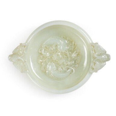 View full screen - View 1 of Lot 7. A white jade marriage bowl, Qing dynasty, 18th / 19th century | 清十八 / 十九世紀 白玉雕年年有餘紋龍耳活環洗.