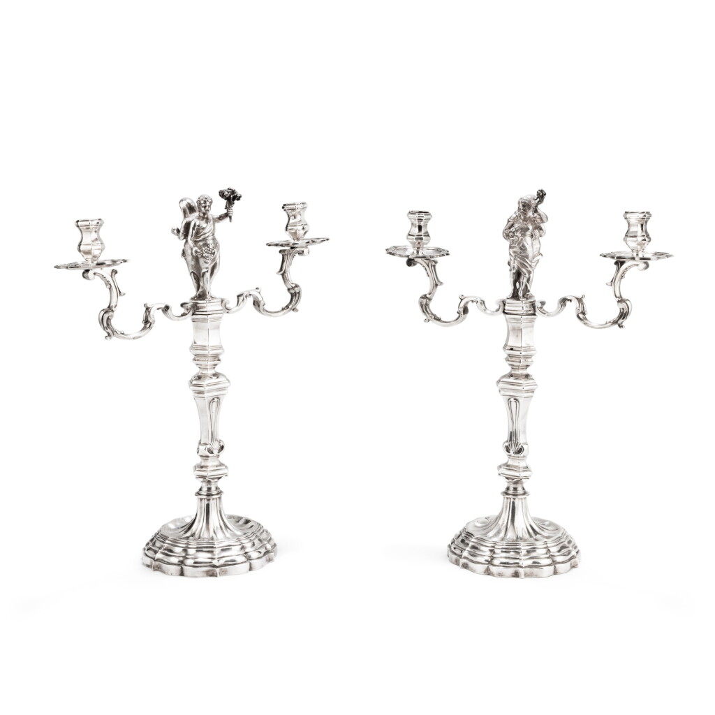 Voir en plein écran - Voir 1 du lot 91. An Italian pair of silver "four seasons" two-light candelabra, Gregorio Spinazzi, Rome, 1759-1774 | Paire de chandeliers à quatre lumières aux quatre saisons en argent par Gregorio Spinazzi, Rome, 1759-1774.