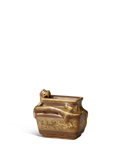 View full screen - View 1 of Lot 9847. A fine and rare gilt-decorated bronze-imitation waterpot, Seal mark and period of Qianlong | 清乾隆 仿銅釉描金塑貼螭龍水盂 《乾隆年製》款.