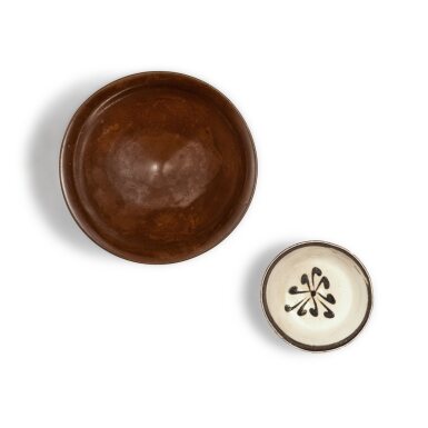 View full screen - View 1 of Lot 245. A persimmon-glazed conical bowl and a painted 'Cizhou' bowl, Northern Song / Jin dynasty | 北宋 / 金 醬釉盌及磁州窰白地黑花盌一組兩件.