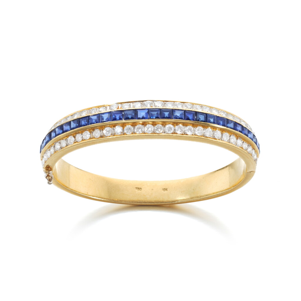 View full screen - View 1 of Lot 909. Sapphire and diamond bangle, circa 1984.