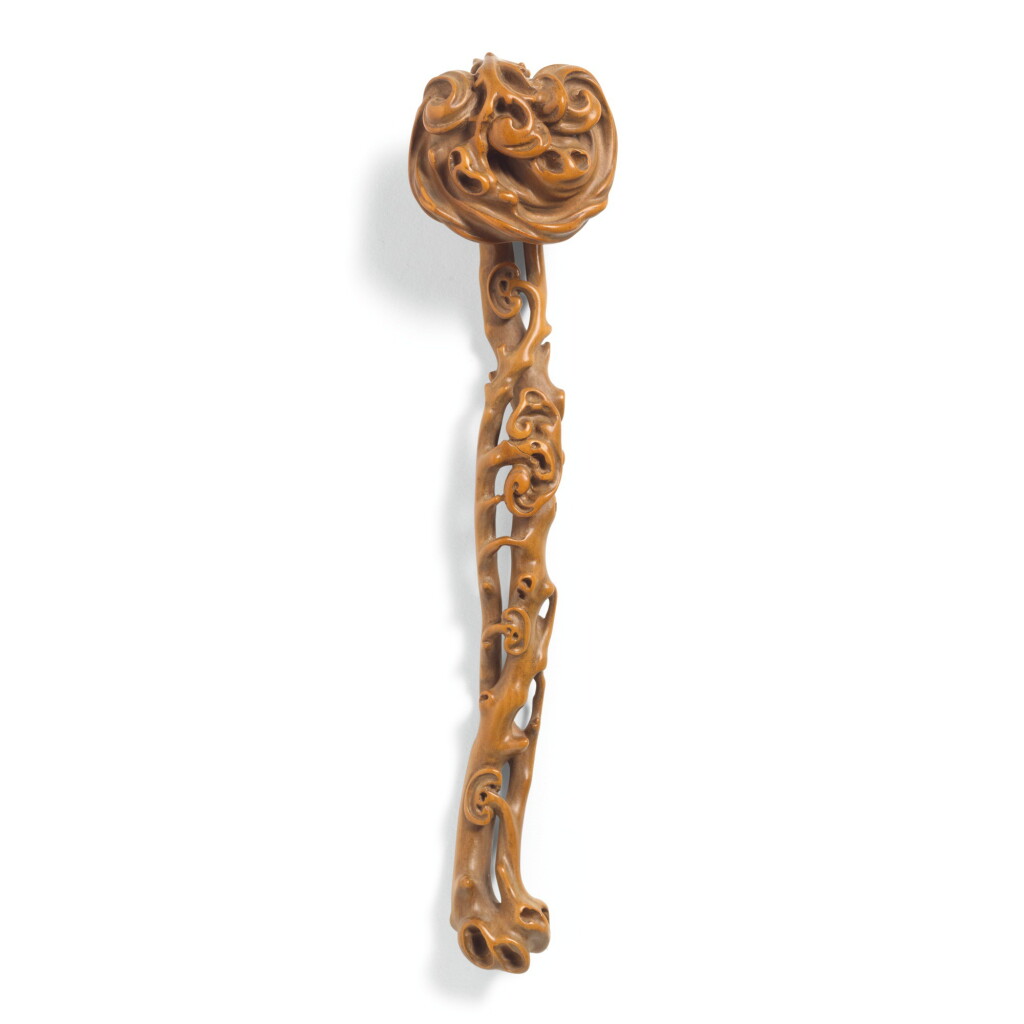 View full screen - View 1 of Lot 116. A SMALL BOXWOOD RUYI SCEPTRE, QING DYNASTY, 18TH/19TH CENTURY | 清十八/十九世紀 黃楊木雕靈芝如意.