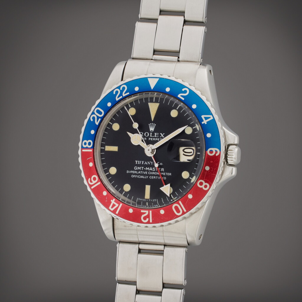 View full screen - View 1 of Lot 149. Reference 1675 GMT-Master | Retailed by Tiffany & Co.: A stainless steel automatic dual time wristwatch with date and bracelet, Circa 1968.