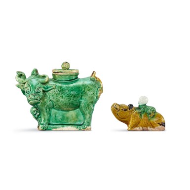View full screen - View 1 of Lot 393. A biscuit-enamelled sancai ‘boy and buffalo’ waterdropper and a ‘buffalo’ ewer and cover Qing dynasty, Kangxi period 清康熙 素三彩童子牧牛水滴及水牛小蓋壺一組.
