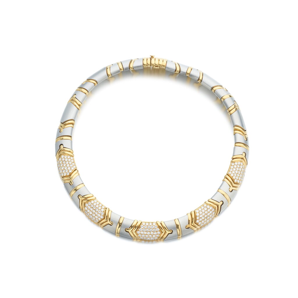 View full screen - View 1 of Lot 825. Gold, steel and diamond necklace, circa 1985.