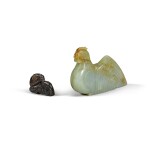 A celadon jade rooster and a black stone figure of a recumbent beast Qing dynasty | 清 青玉天鷄 及 黑石瑞獸 一組兩件