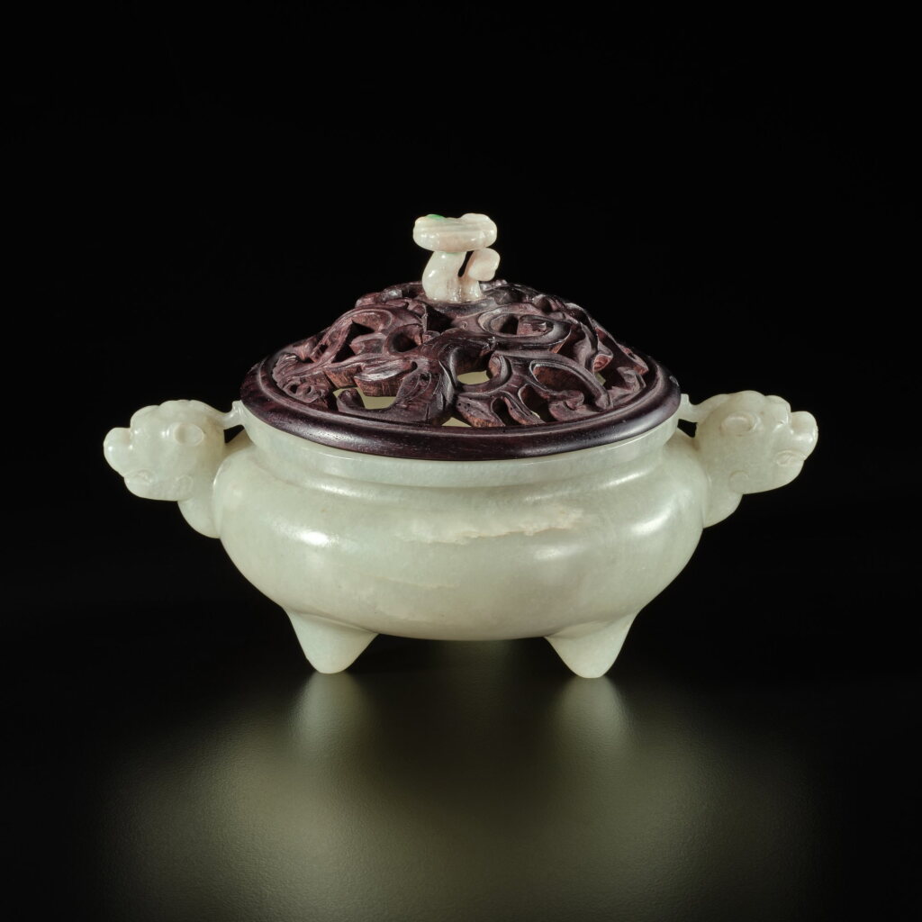 View full screen - View 1 of Lot 293. A celadon jade tripod censer, Qing dynasty, 18th century | 清十八世紀 青玉雕獸耳三足爐.