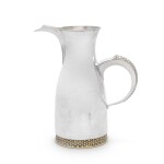 A silver and silver-gilt ewer, Asprey & Co. Ltd., London, 1974, designed by Anthony Elson