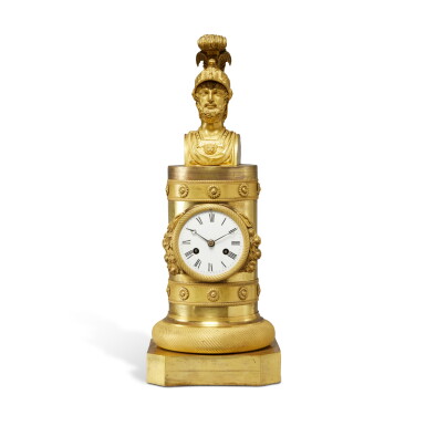 View full screen - View 1 of Lot 1172. An Empire Gilt-Bronze Mantel Clock, First Quarter 19th Century, together with Two Brass Cannons.