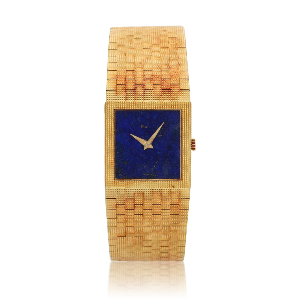 View full screen - View 1 of Lot 170. Reference 9131 C 4, A yellow gold rectangular bracelet watch with lapis lazuli dial, Circa 1972.