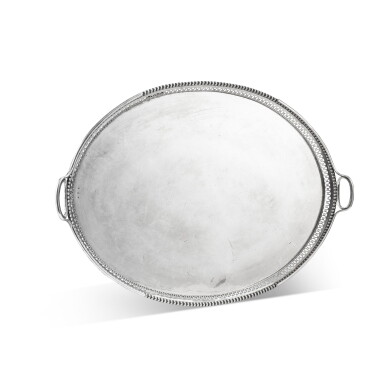 View full screen - View 1 of Lot 443. A large German oval silver two-handled tray, Augsburg, circa 1800 | Grand plateau ovale à deux anses en argent, Augsbourg, vers 1800.