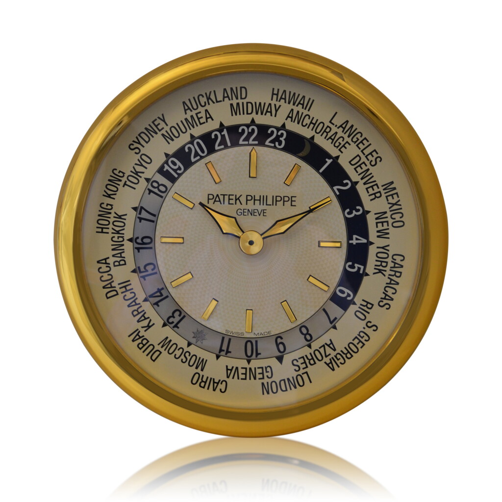 View full screen - View 1 of Lot 470. Gilt brass world time wall clock Circa 2000.