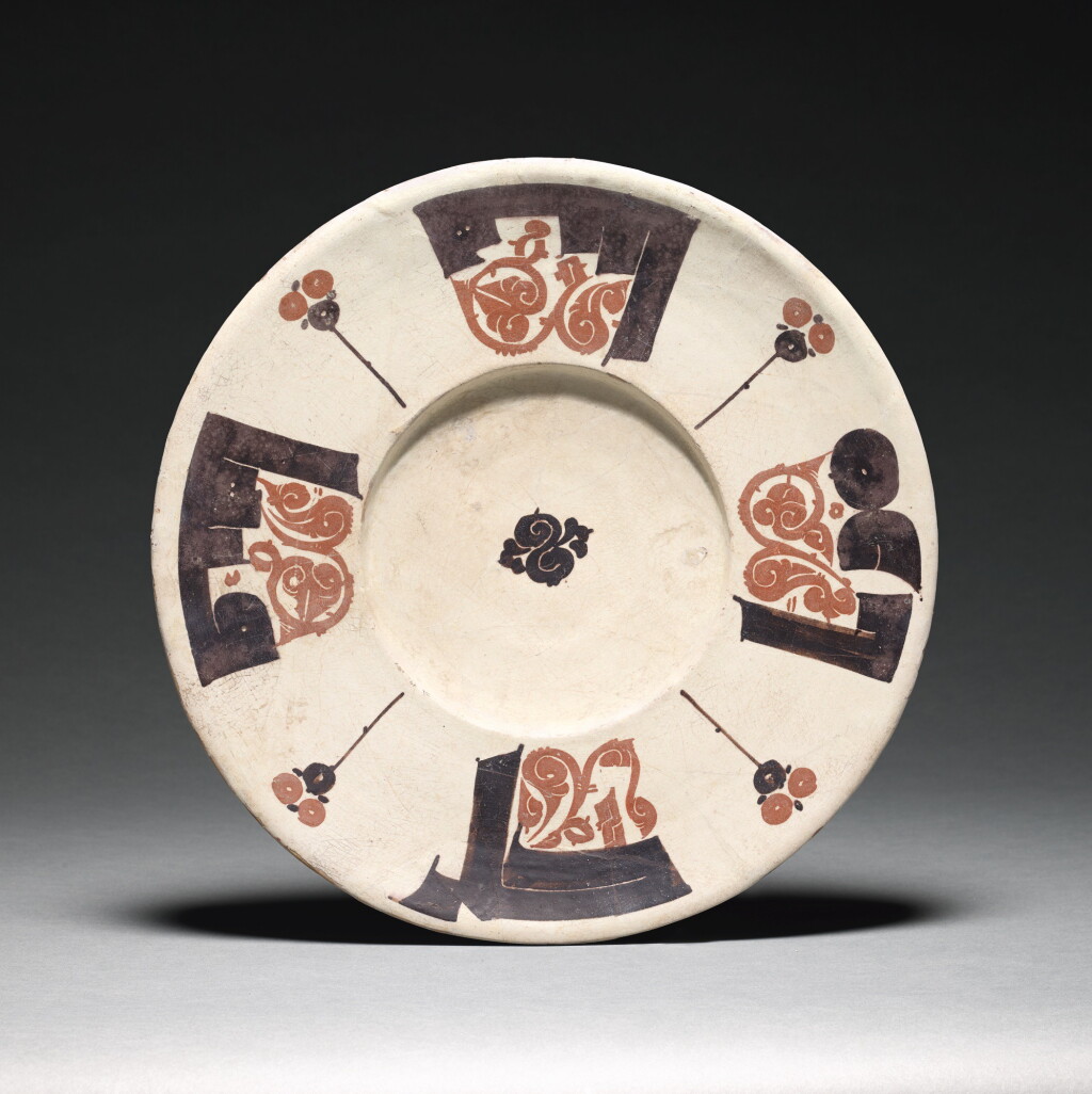 View full screen - View 1 of Lot 209. A RARE BICHROME CALLIGRAPHIC POTTERY DISH, NISHAPUR OR SAMARQAND, 10TH CENTURY.