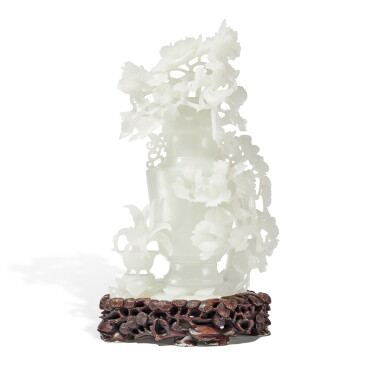 View full screen - View 1 of Lot 96. A white jade 'floral' vase and cover, 20th century | 二十世紀 白玉雕花卉瓶連蓋.