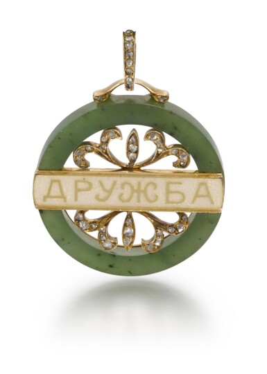 View full screen - View 1 of Lot 69. A Fabergé jewelled gold-mounted and guilloché enamelled nephrite pendant, Moscow, 1899-1908.