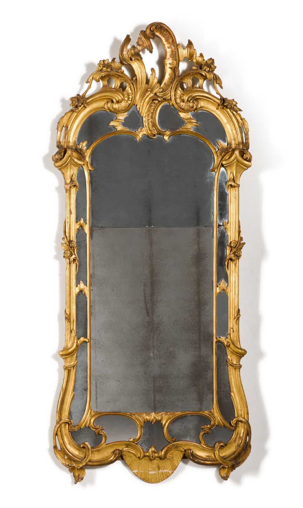 View full screen - View 1 of Lot 11. A German carved giltwood mirror, third quarter 18th century.