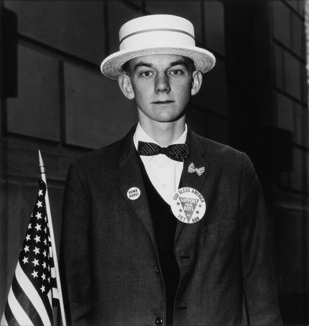 View full screen - View 1 of Lot 119. 'Boy with a Straw Hat Waiting to March in a Pro-War Parade, N. Y. C.'.