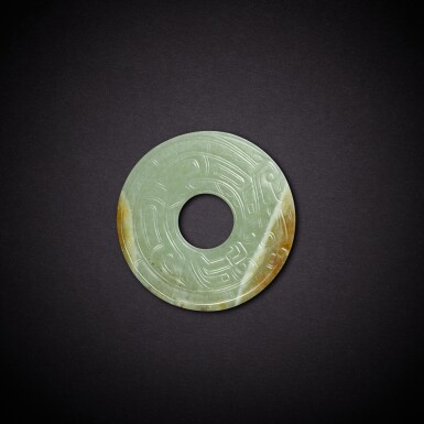 View full screen - View 1 of Lot 6827. A celadon jade 'dragon' disc, bi, Western Zhou dynasty | 西周 青玉龍紋璧.