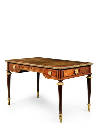 View full screen - View 1 of Lot 49. A LOUIS XVI GILT-BRONZE MOUNTED MAHOGANY AND ACAJOU MOUCHETÉ BUREAU PLAT, LATE 18TH CENTURY AND LATER.