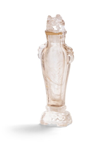 View full screen - View 1 of Lot 120. A rare carved rock crystal vase and cover on stand Qing dynasty, 18th-19th century | 清十八至十九世紀 水晶雙獸耳蓋紋.