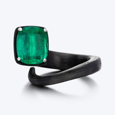 View full screen - View 1 of Lot 1005. Carbon fibre, white gold and emerald ring, 'Nail' .