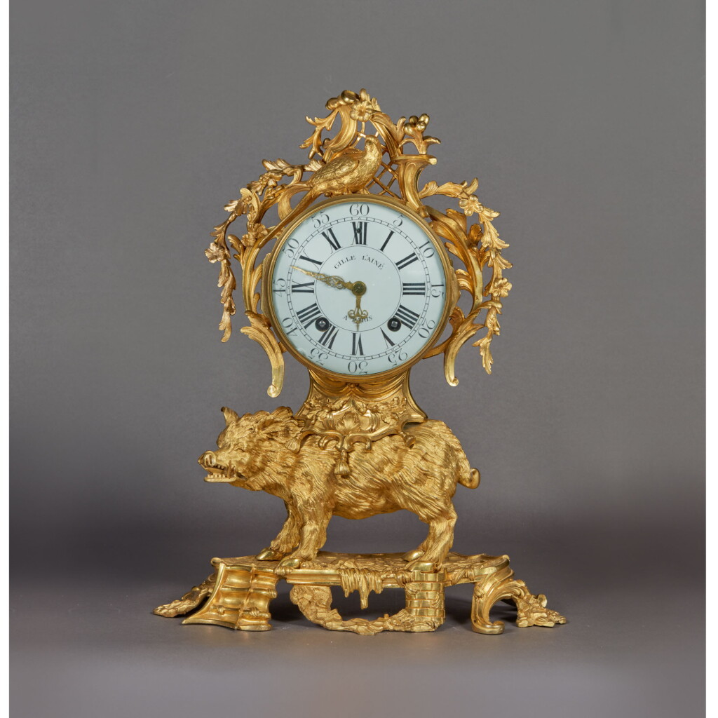 View full screen - View 1 of Lot 149. A LOUIS XV GILT BRONZE MANTEL CLOCK, CIRCA 1750.