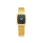 PIAGET | REFERENCE 8181 A6, A YELLOW GOLD BRACELET WATCH WITH ONYX HARDSTONE "ARABIC” DIAL, CIRCA 1985