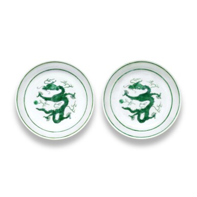 View full screen - View 1 of Lot 30. A pair of green-enamelled 'dragon' dishes, Marks and period of Tongzhi.