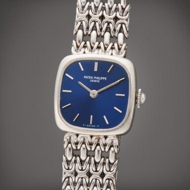 View full screen - View 1 of Lot 26. Reference 4459/1 | A white gold cushion shaped bracelet watch, Owned by Joanne Woodward, Circa 1980.