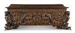 An Italian carved and parcel-gilt walnut cassone