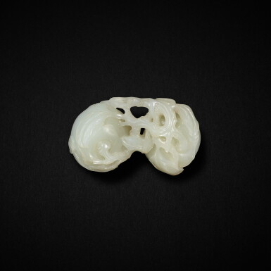 View full screen - View 1 of Lot 719. A white jade 'peach' group, Qing dynasty, 19th century | 清十九世紀 白玉折枝雙桃擺件.