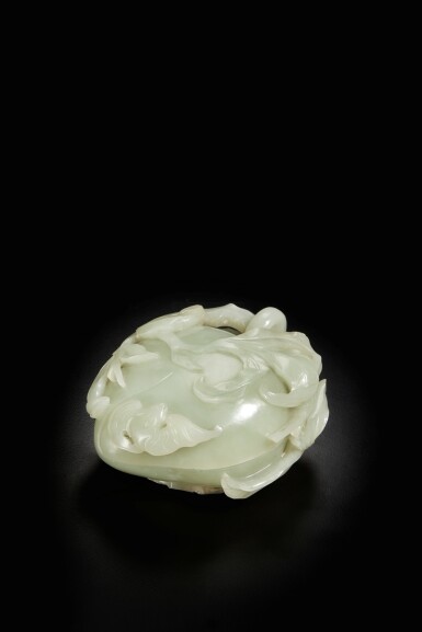 View full screen - View 1 of Lot 178. A pale celadon jade 'peach' box and cover, Qing dynasty, Qianlong period.