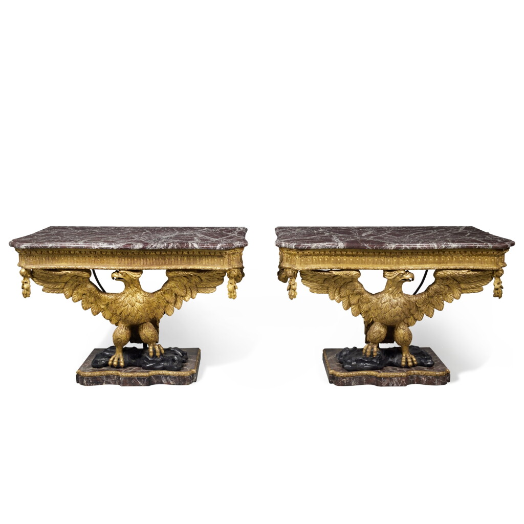 View full screen - View 1 of Lot 13. A Pair Of George II Style Carved Giltwood, Bronzed and Painted Console Tables, Late 19th/early 20th century, the marble tops later.