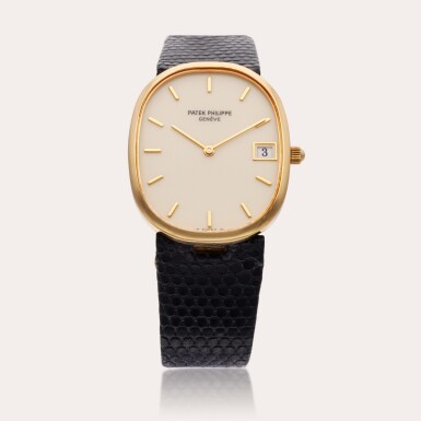 View full screen - View 1 of Lot 467. Reference 3788 Golden Ellipse | A yellow gold automatic oval wristwatch with date, Circa 1985.
