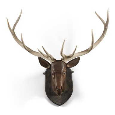View full screen - View 1 of Lot 342. A PAINTED AND CARVED WOOD STAG'S HEAD WALL MOUNT.
