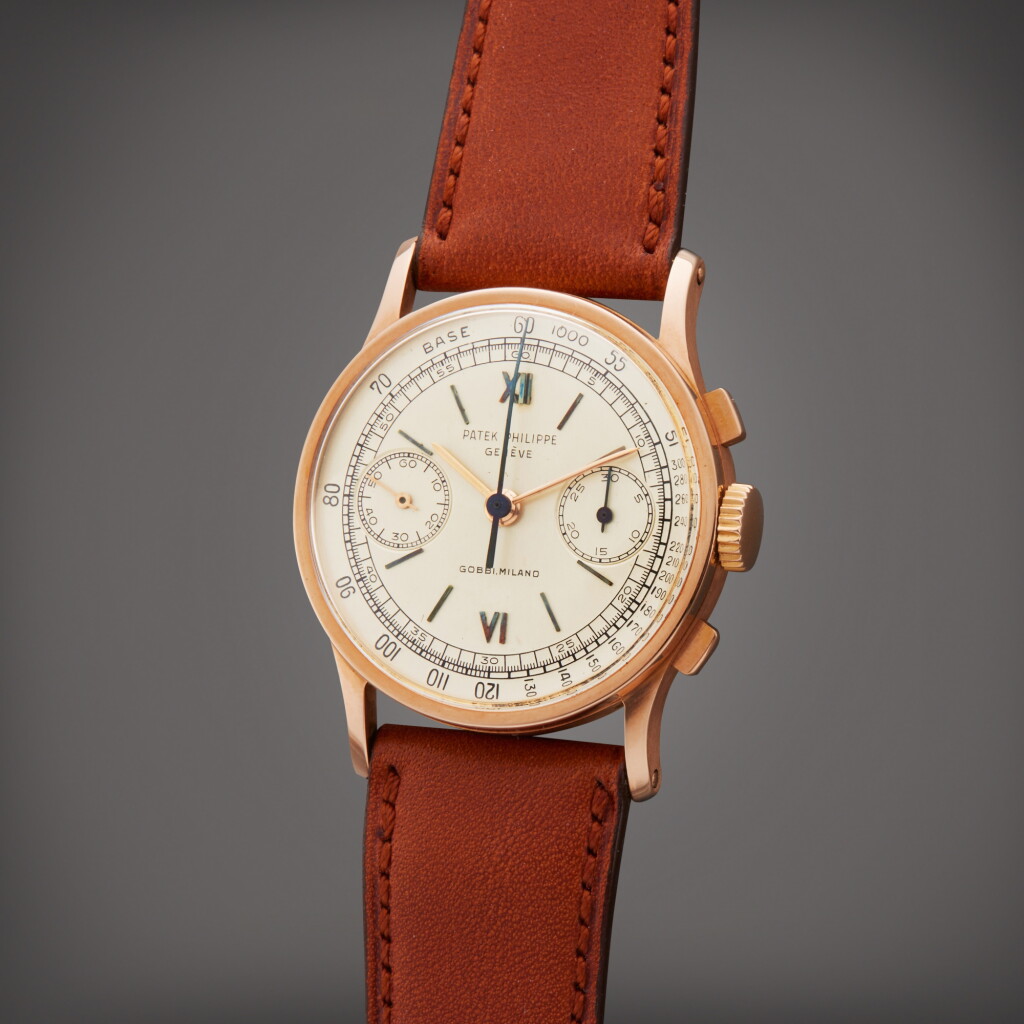 View full screen - View 1 of Lot 34. Reference 130 | Retailed by Gobbi Milano: A pink gold chronograph wristwatch, Made in 1953.