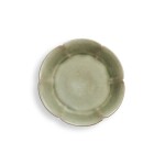 A small 'Yaozhou' celadon-glazed mallow-form dish, Northern Song / Jin dynasty