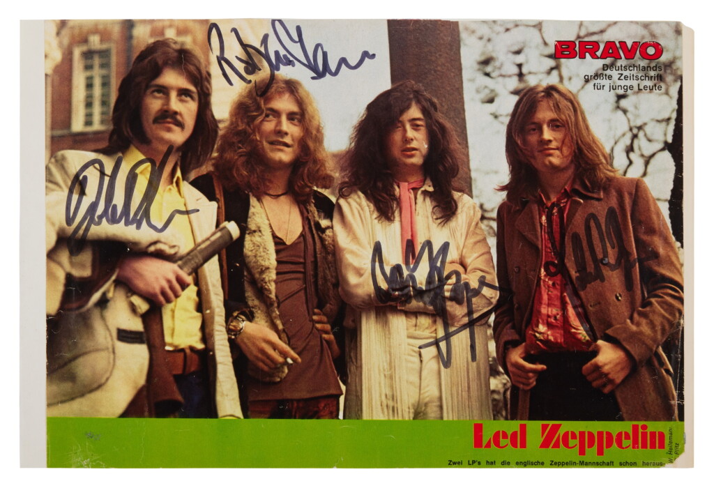 View full screen - View 1 of Lot 86. Led Zeppelin | A signed magazine clipping.