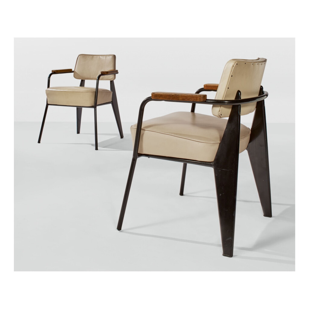 View full screen - View 1 of Lot 210. JEAN PROUVÉ | PAIR OF "DIRECTION" ARMCHAIRS, MODEL NO. 352.
