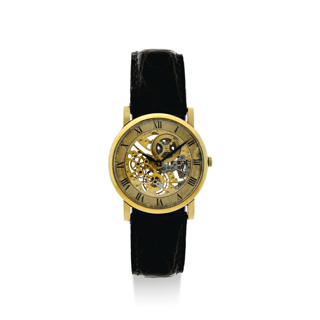 View full screen - View 1 of Lot 32. A YELLOW GOLD SEMI-SKELETONIZED WRISTWATCH, CIRCA 1975.
