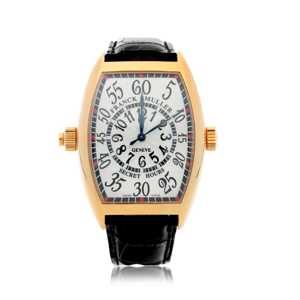 View full screen - View 1 of Lot 55. FRANCK MULLER | REFERENCE 7880 SE H II SECRET HOURS A YELLOW GOLD TONNEAU FORM AUTOMATIC CENTER SECONDS WRISTWATCH, CIRCA 2010.