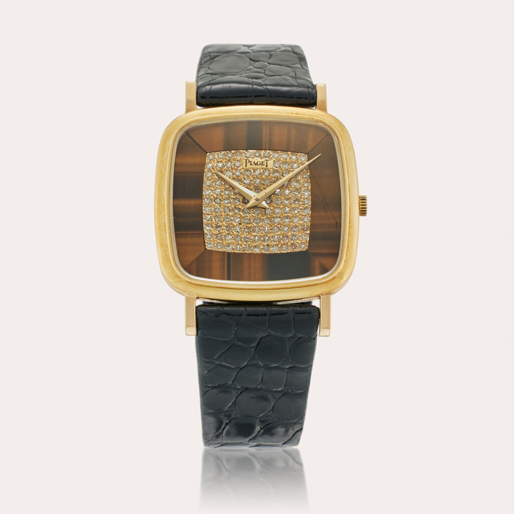 View full screen - View 1 of Lot 285. Reference 9771 N 90 | A yellow gold and diamond-set cushion-shaped wristwatch with tiger’s eye dial, Circa 1975.