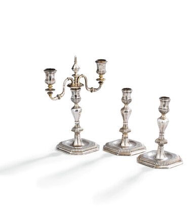 View full screen - View 1 of Lot 196. A PAIR OF TWO SILVER CANDELSTICKS AND A TWO LIGHTS CANDELABRA, GENOVA, CIRCA 1721 | PAIRE DE FLAMBEAUX ET UN CANDÉLABRE À DEUX LUMIÈRES EN ARGENT, GÊNES, VERS 1721.